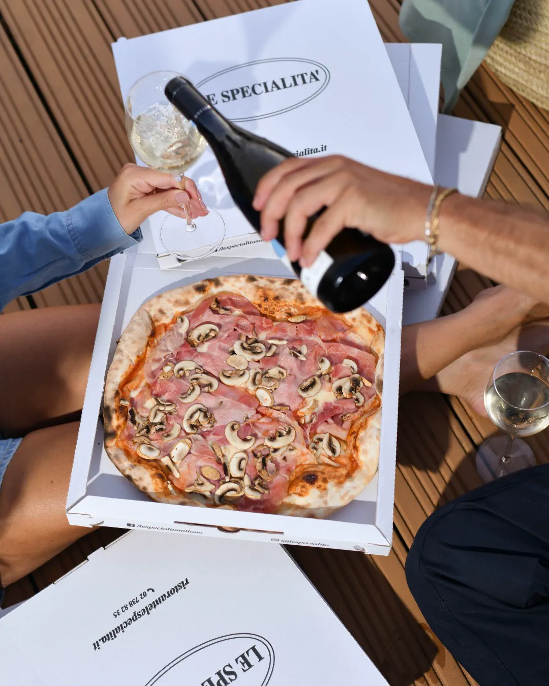 Golden hour, friends and premium pizza.